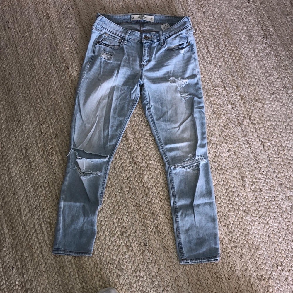Distressed mid rise jeans